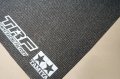 alt="Tamiya 42250 - Maintenance Mat (1250x600mm) Black with TRF logo" title="Tamiya 42250 - Maintenance Mat (1250x600mm) Black with TRF logo"